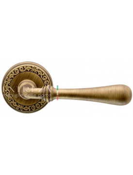 Дверная ручка Extreza "EVA" (Эва) 319 на розетке R06 матовая бронза F03