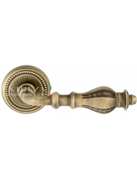 Дверная ручка Extreza "EVITA" (Эвита) 301 на розетке R03 матовая бронза F03