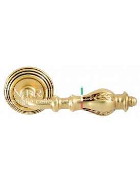 Дверная ручка Extreza "EVITA" (Эвита) 301 на розетке R05 французское золото + коричневый F59