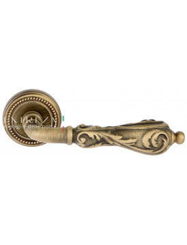 Дверная ручка Extreza "GRETA" (Грета) 302 на розетке R03 матовая бронза F03
