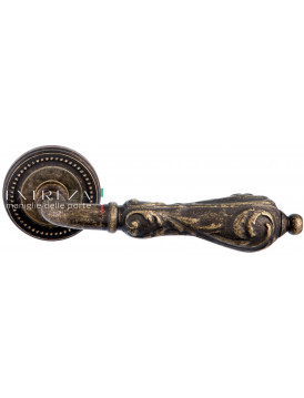 Дверная ручка Extreza "GRETA" (Грета) 302 на розетке R03 античная бронза F23