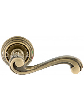 Дверная ручка Extreza "LINA" (Лина) 313 на розетке R05 матовая бронза F03