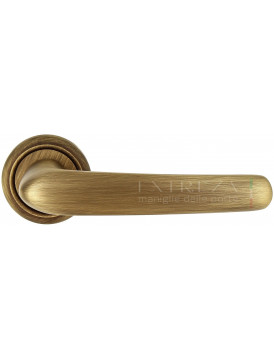 Дверная ручка Extreza "MONACO" (Монако) 330 на розетке R01 матовая бронза F03