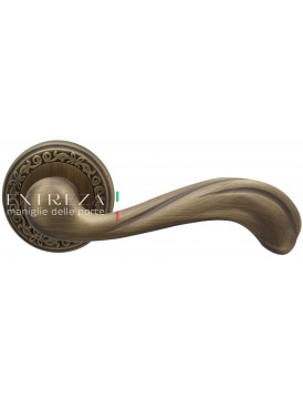 Дверная ручка Extreza "NINA" (Нина) 317 на розетке R06 матовая бронза F03