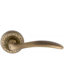 Дверная ручка Extreza "SIMONA" (Симона) 314 на розетке R06 матовая бронза F03